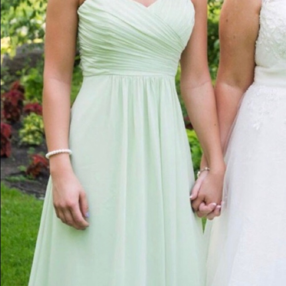 Light green bridesmaid dress.